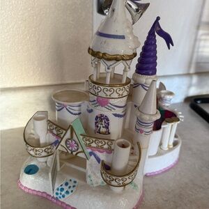 Whimsical Castle Figurine with Purple Accents